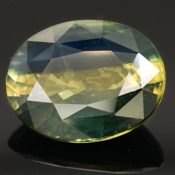 Saphir bicolore bleu-jaune 3.54 carats ovale non chauffé - vue 1